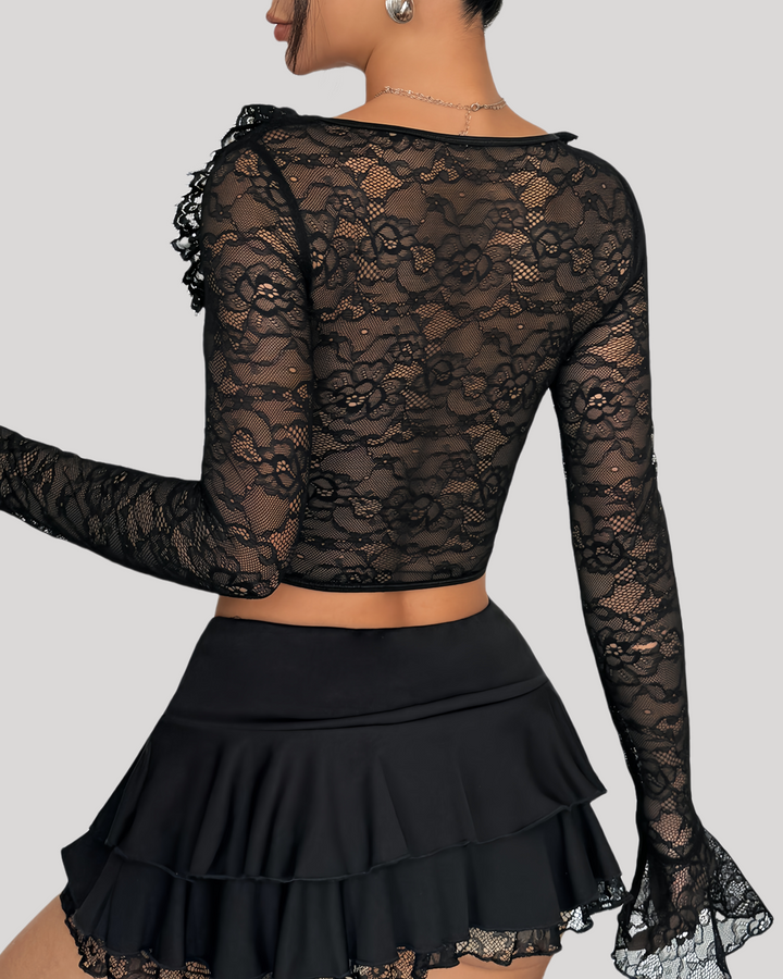 Back view of black lace bustier showing sheer floral pattern