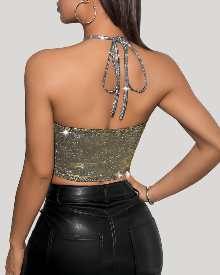 Back view of gradient glitter halter top with tie closure and fitted silhouette