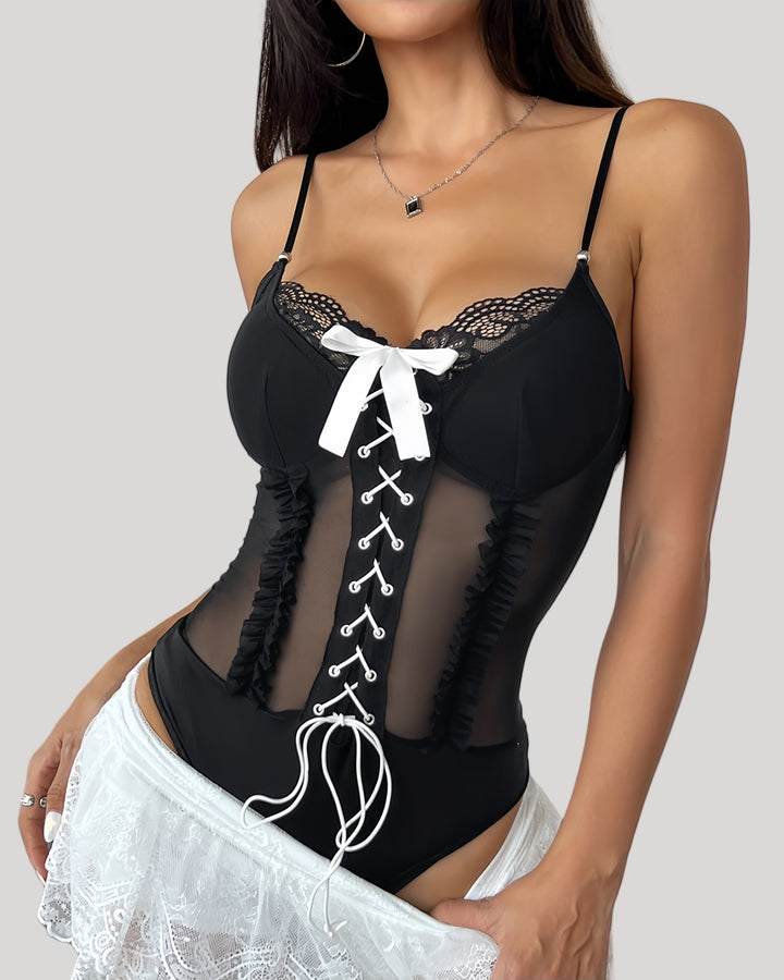 Black mesh panel bodysuit with white bow and lace details – front view