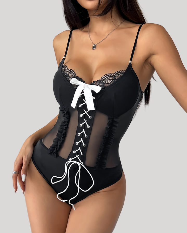 Black mesh panel bodysuit with white bow and lace details – front view
