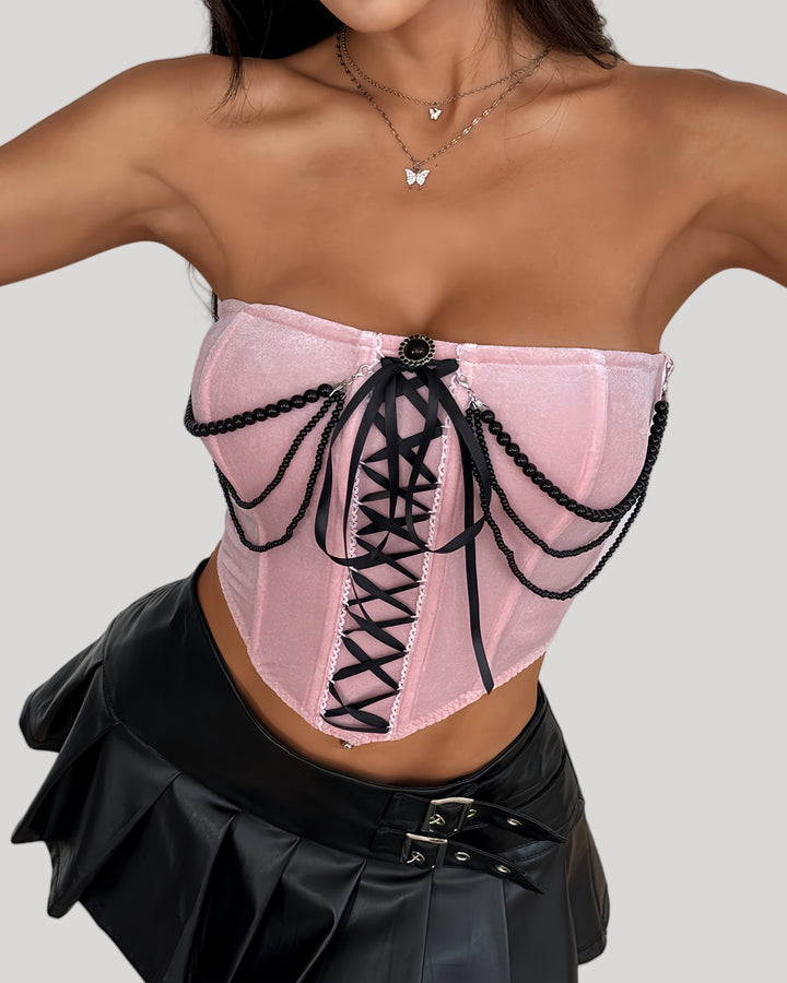Pink strapless bustier with black chain draping and front lace-up ribbon