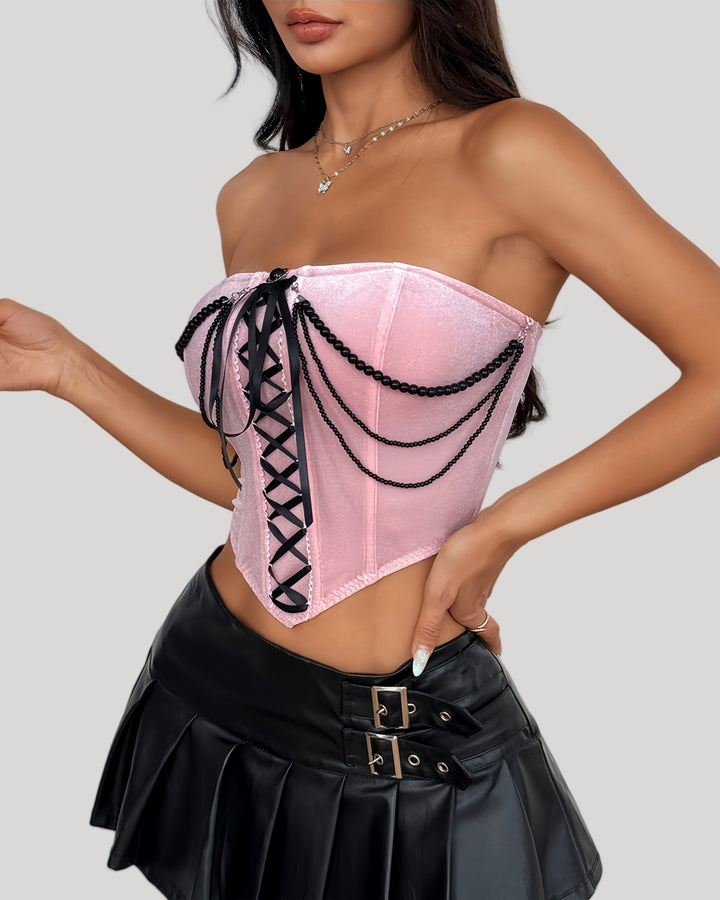 Pink strapless bustier with black chain draping and front lace-up ribbon