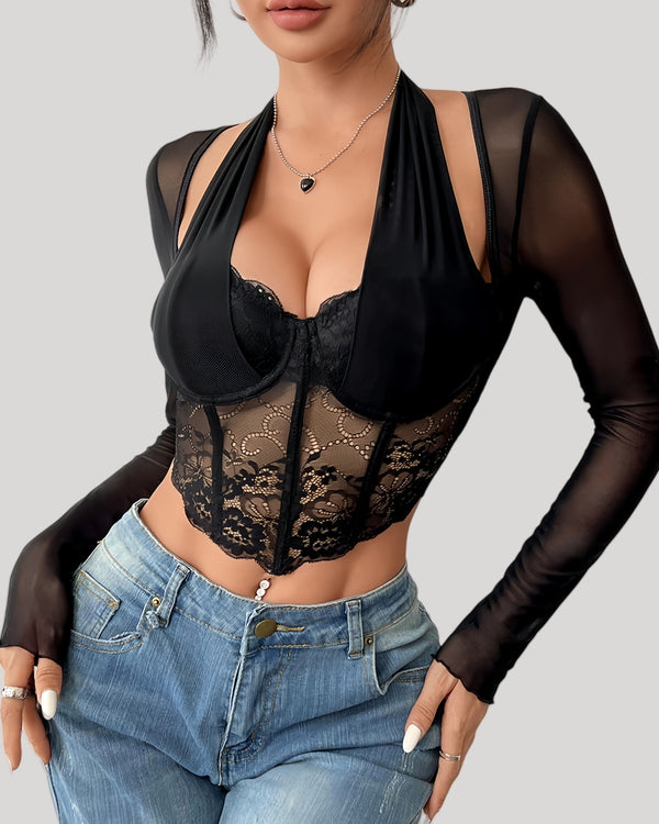 Front view of model wearing sheer lace halter long sleeve top with jeans