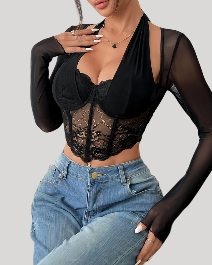 Front view of model wearing sheer lace halter long sleeve top with jeans