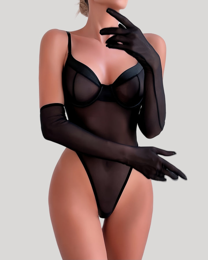 Model wearing sheer black underwire mesh teddy with matching gloves, front view