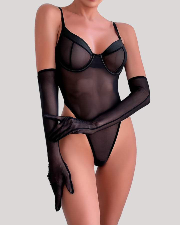 Model wearing sheer black underwire mesh teddy with matching gloves, front view