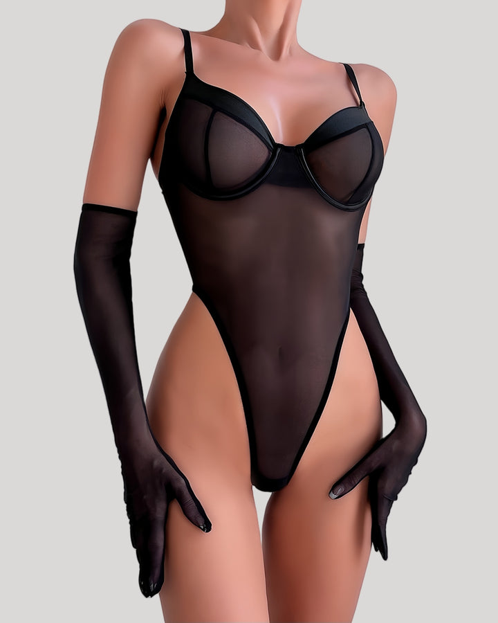 Model wearing sheer black underwire mesh teddy with matching gloves, front view