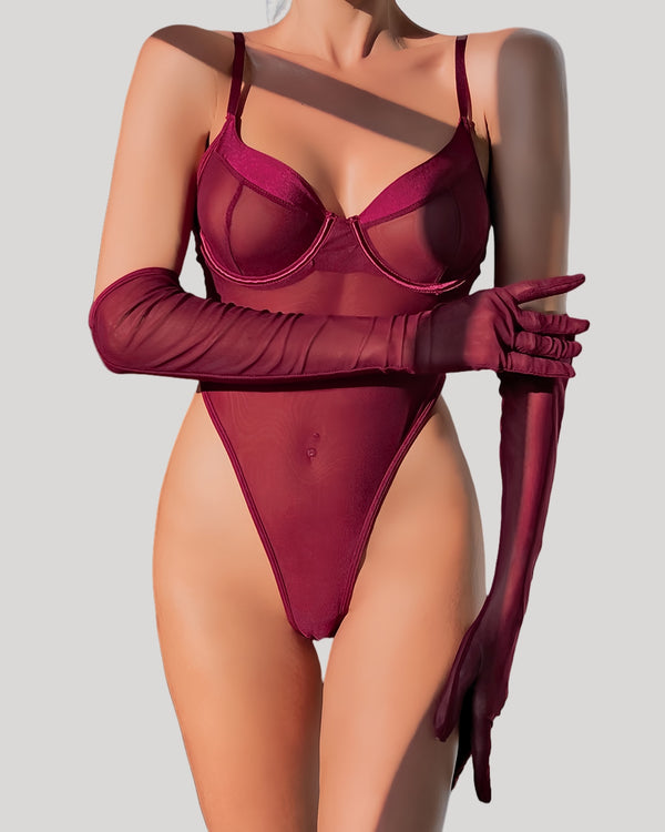 Model wearing sheer red underwire mesh teddy with matching gloves, front view