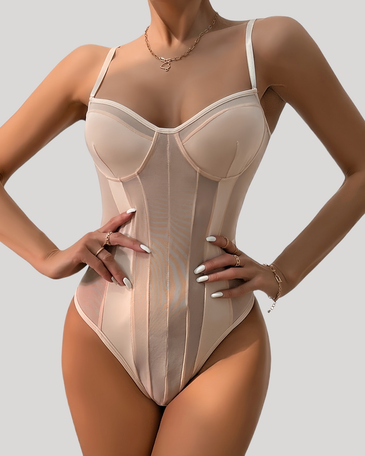 Pink sheer mesh underwire bodysuit front view on model standing