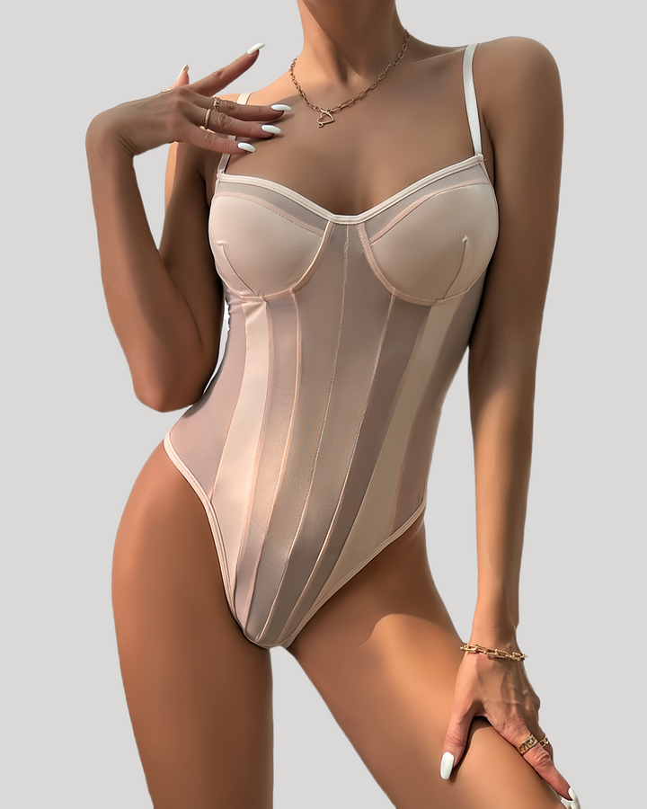 Pink sheer mesh underwire bodysuit front view on model standing