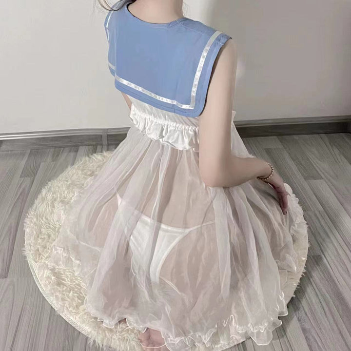 Back view of sheer babydoll dress showing ruffled hem and included panty