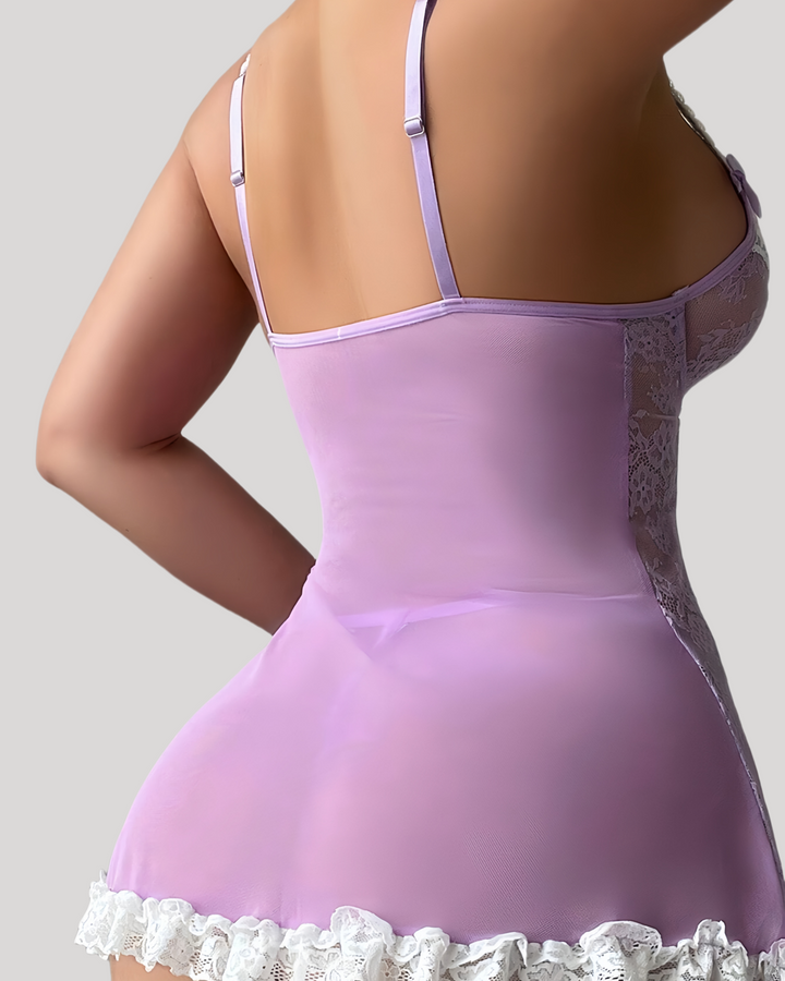 Back view showing purple mesh back panel and white lace hem