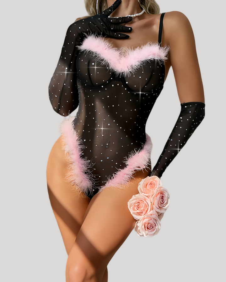 Front view of sheer bodysuit with pink feather trim and sparkling rhinestones