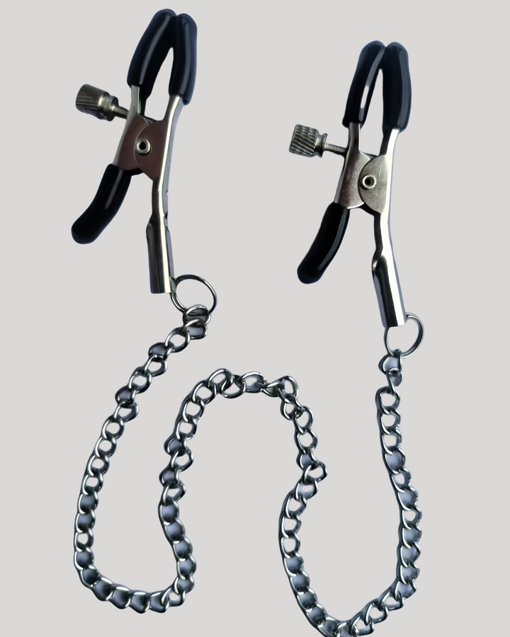 Pair of metal nipple clamps with silicone tips and a connecting chain