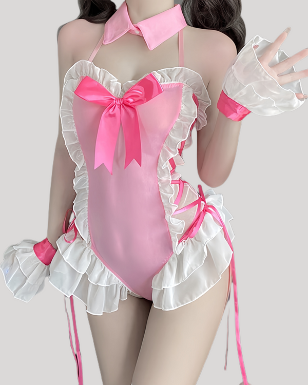 Model wearing pink bunny teddy with white ruffles and bow