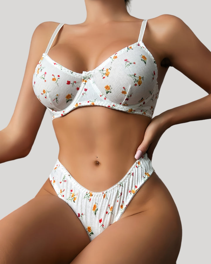 Model wearing floral bra and high-cut panty set