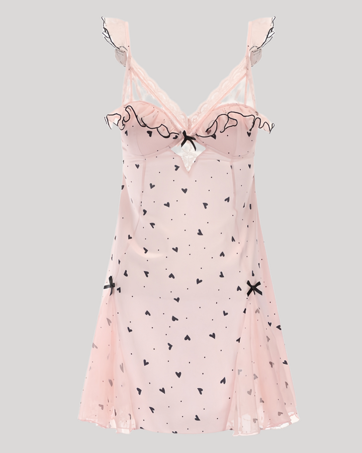 Flat lay of pink heart print lace babydoll dress