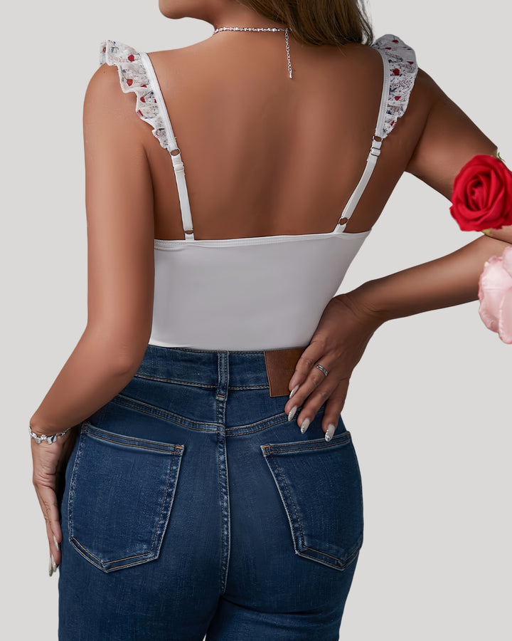 Back view of bodysuit showing plain stretch panel and adjustable straps
