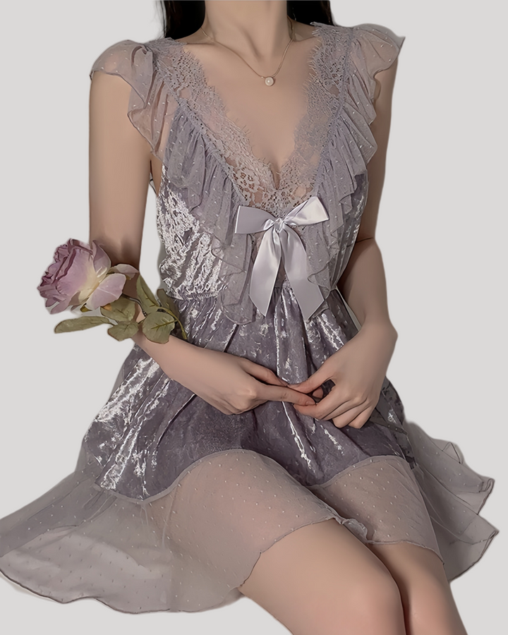 Model in purple off-shoulder lace babydoll with ruffle details