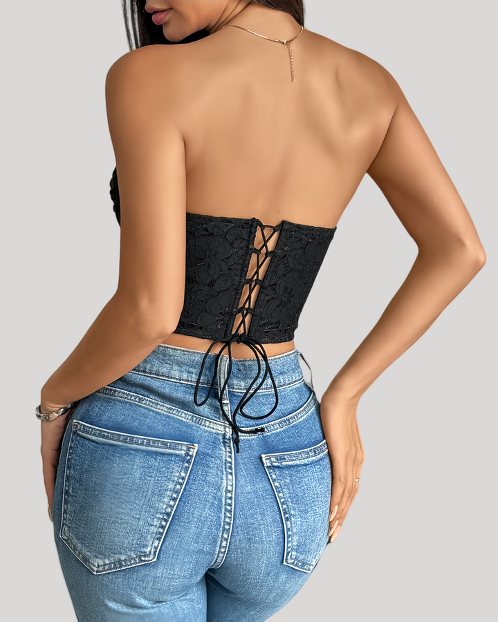 Back view of black lace bustier with criss-cross lace-up closure