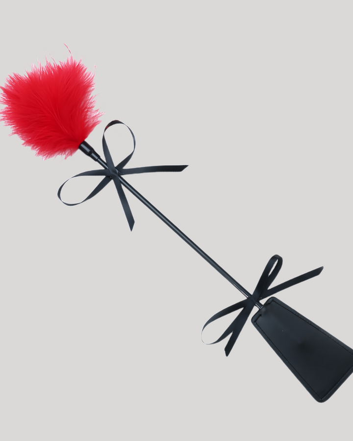 Red feather and paddle combo with black ribbon detail